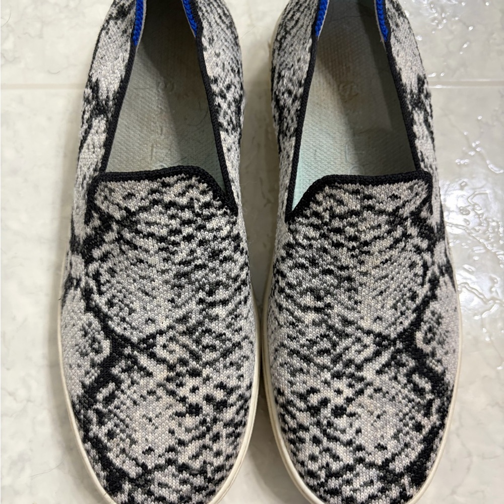Rothy's Monochrome Slip-On Sneakers with Blue Accents